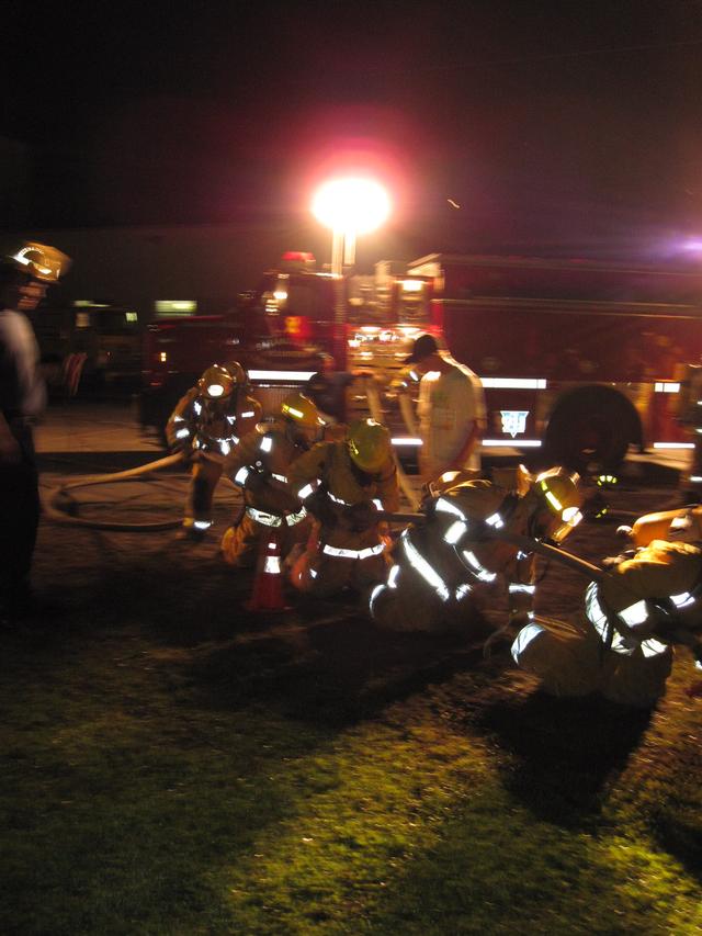 SLVFD members Craig Barry, Jim Stinson, Garret Krasher, and Lewis VFD member Mike Flynn negotiate cone drill in full PPE 8/11/2010